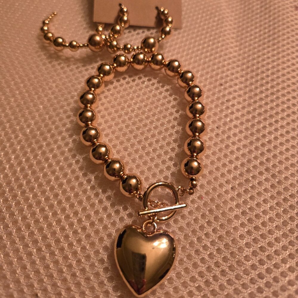 Single strand gold ball bracelet with heart charm and  gold ball hoops to match
